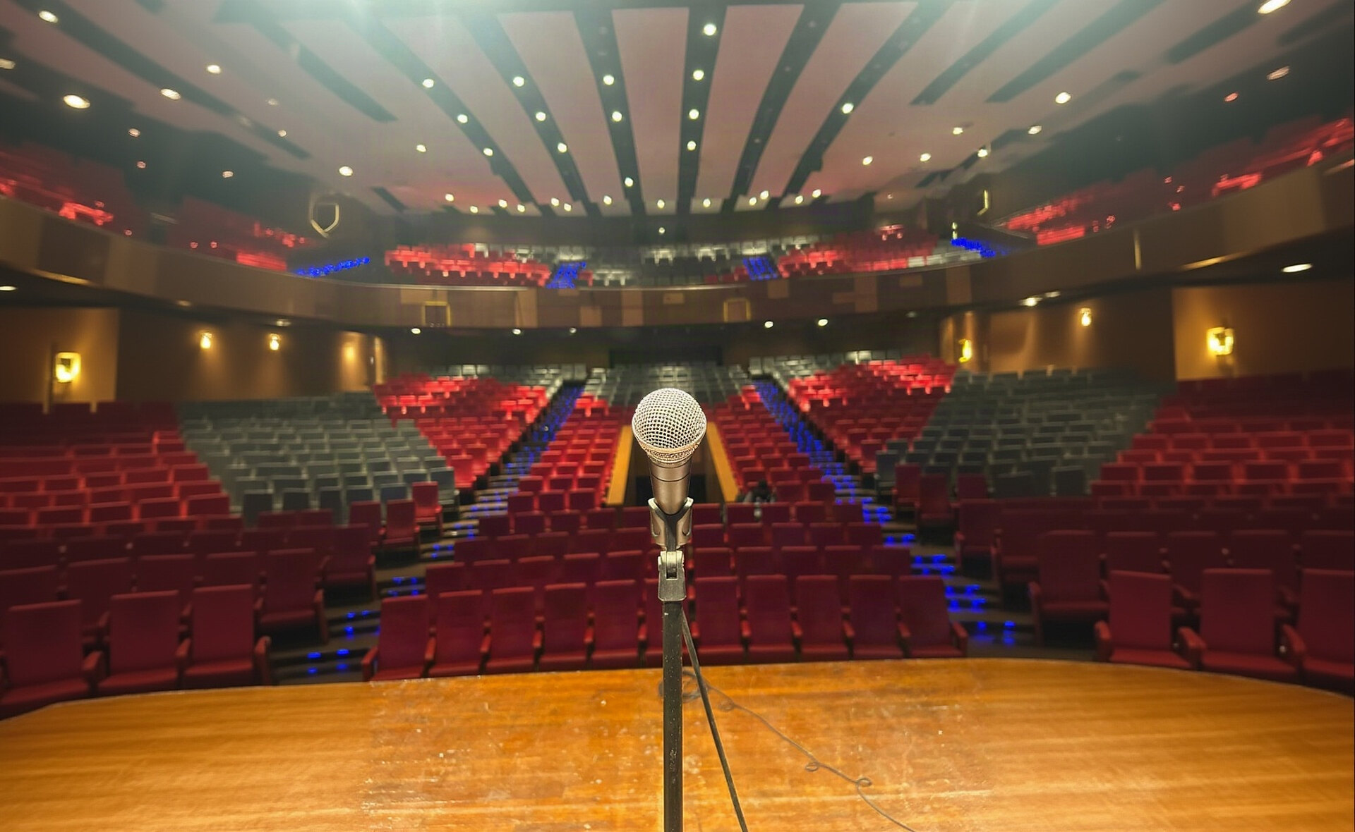 Microphone on stage looking out over the empty auditorium before a Show Company production